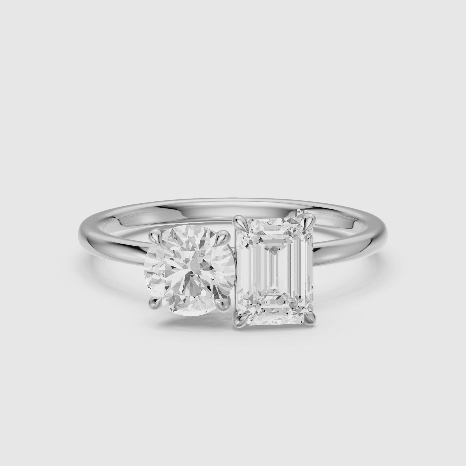 Load video: Ayslee Toi Et Moi Engagement Ring With Round and Emerald Cut Moissanite Diamonds
