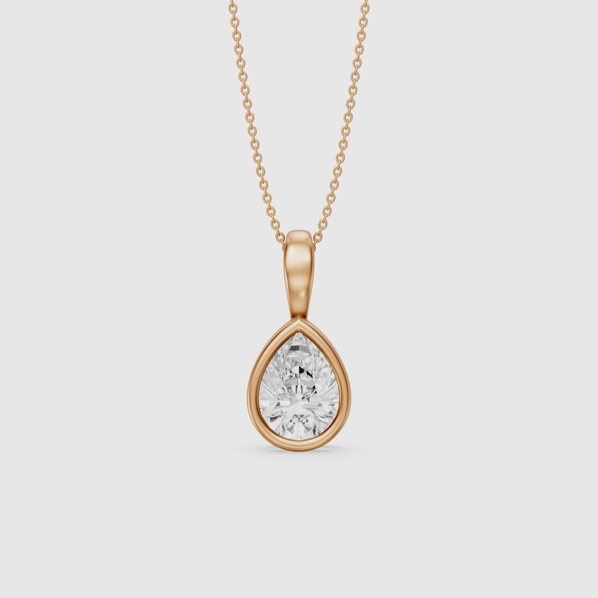 Load video: Mary Pear Shape Bezel Set Lab Grown Diamond Solitaire Pendant