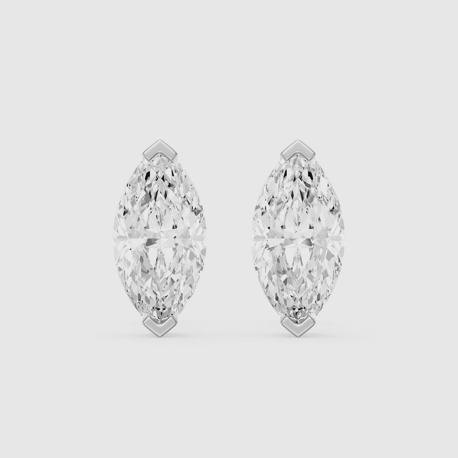 Load video: Eleanora Marquise Cut Lab Diamond North South Solitaire Stud Earrings