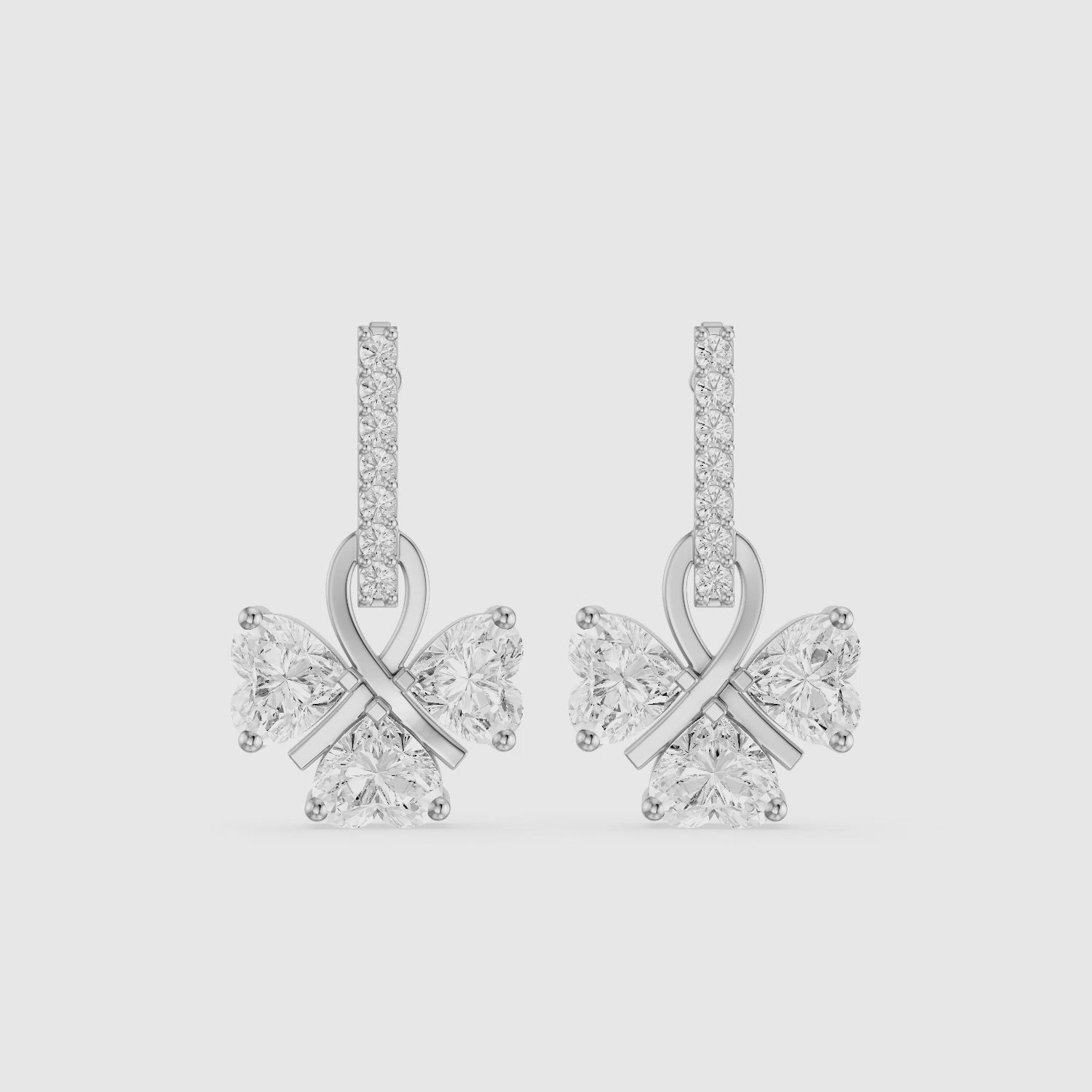 Load video: Kaori Round and Heart Lab Grown Diamond Drop Earrings with Ribbon Design