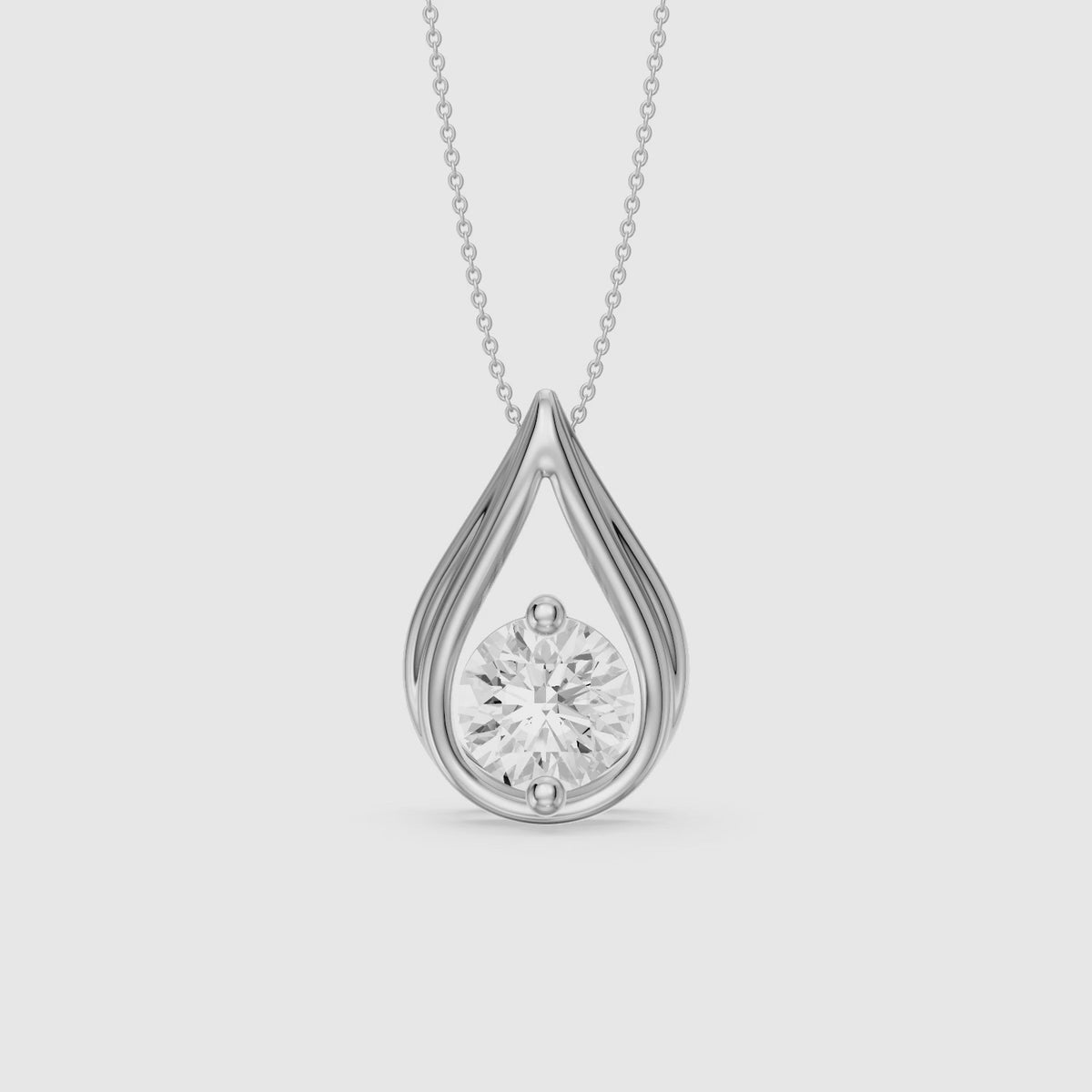 Load video: Lucille Floating Round Lab Grown Diamond Teardrop Pendant