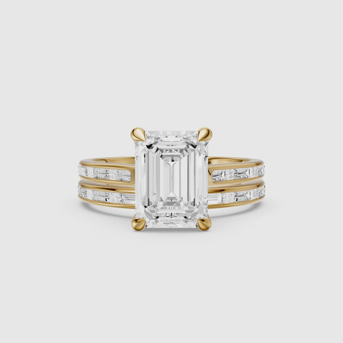 Load video: Maribel Emerald Cut Lab Grown Diamond Channel Set Baguette Bridal Set