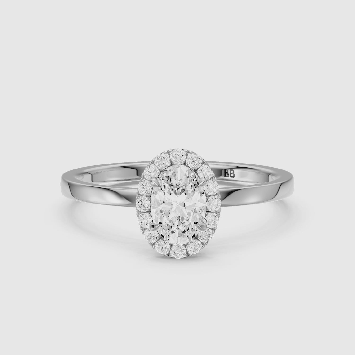 Load video: Oakley Oval Cut Halo Moissanite Diamond Engagement Ring