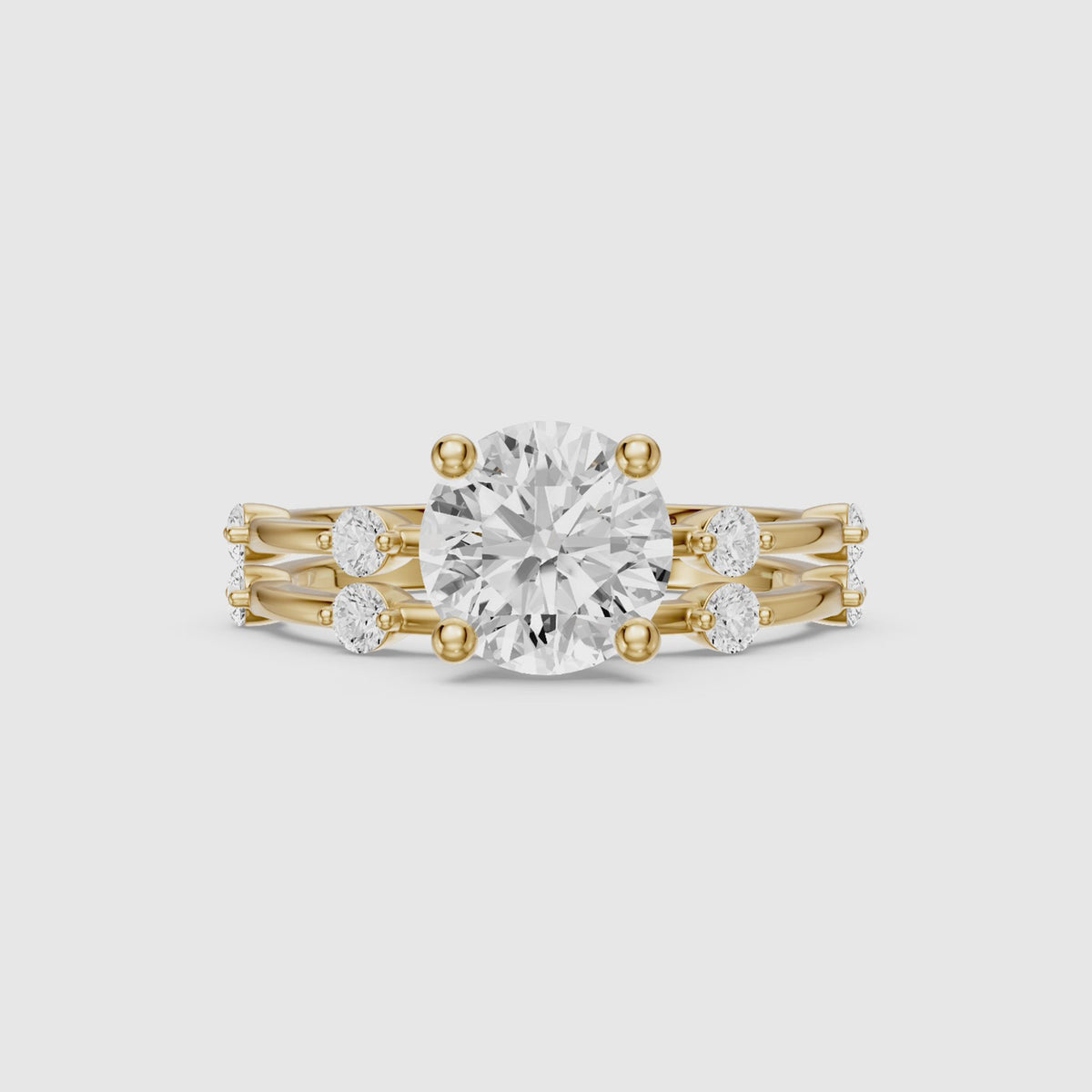 Load video: Ivone Round Lab Grown Diamond Station Accent Bridal Set