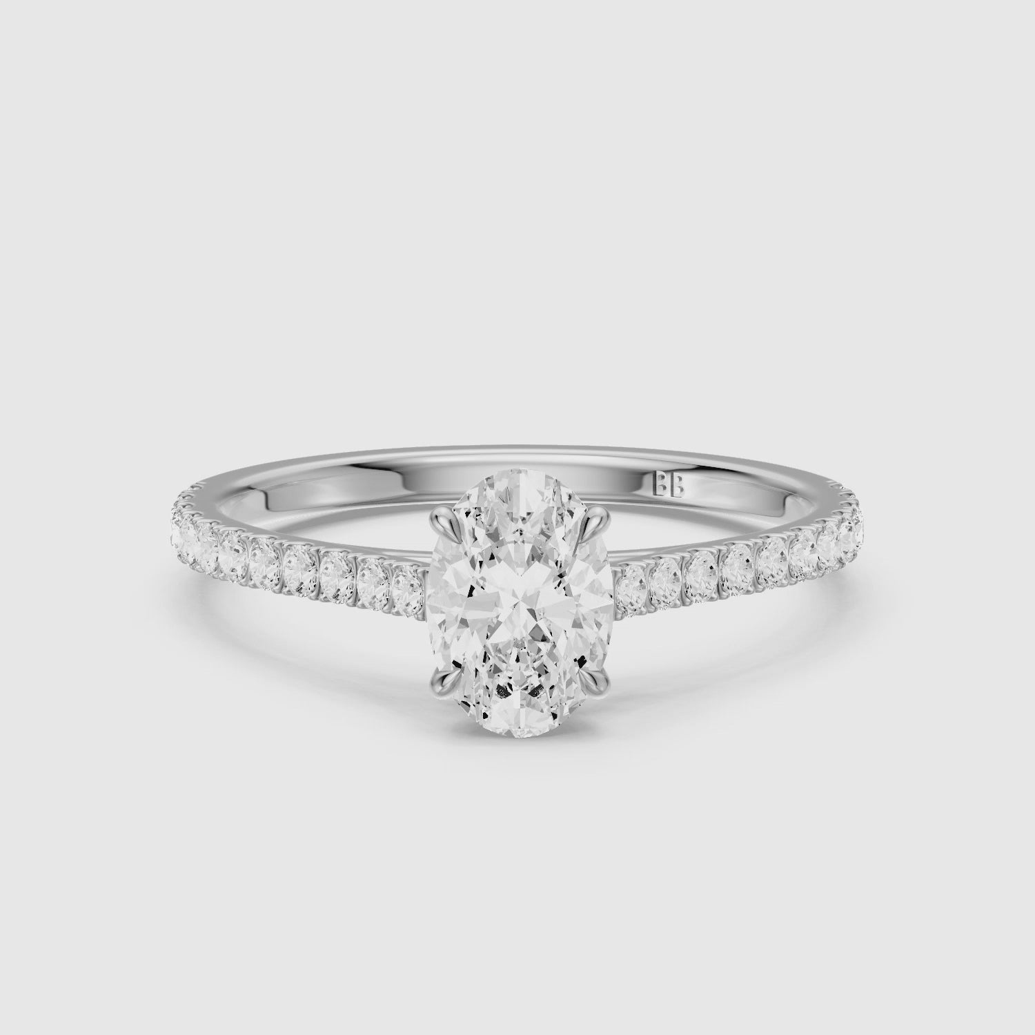 Load video: Lively Oval Cut Pave Side Stone Cathedral Style Lab Grown Diamond Ring