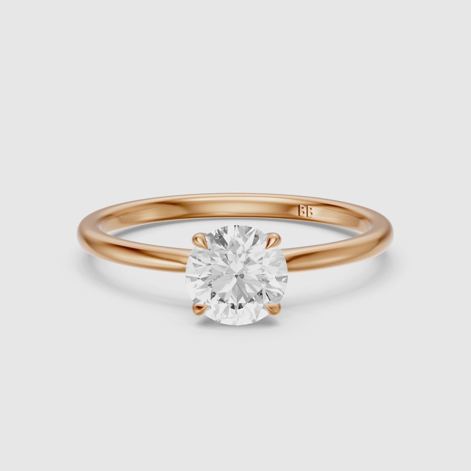 Load video: Carmen 4 Prong Round Cut Solitaire Moissanite Diamond Ring