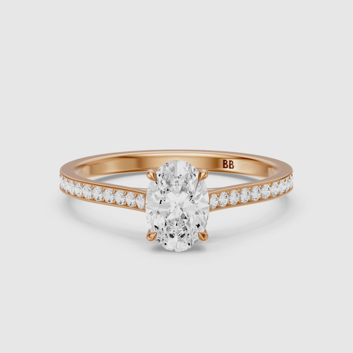 Load video: Ariyah Oval Cut Channel Set Side Stone Moissanite Diamond Ring