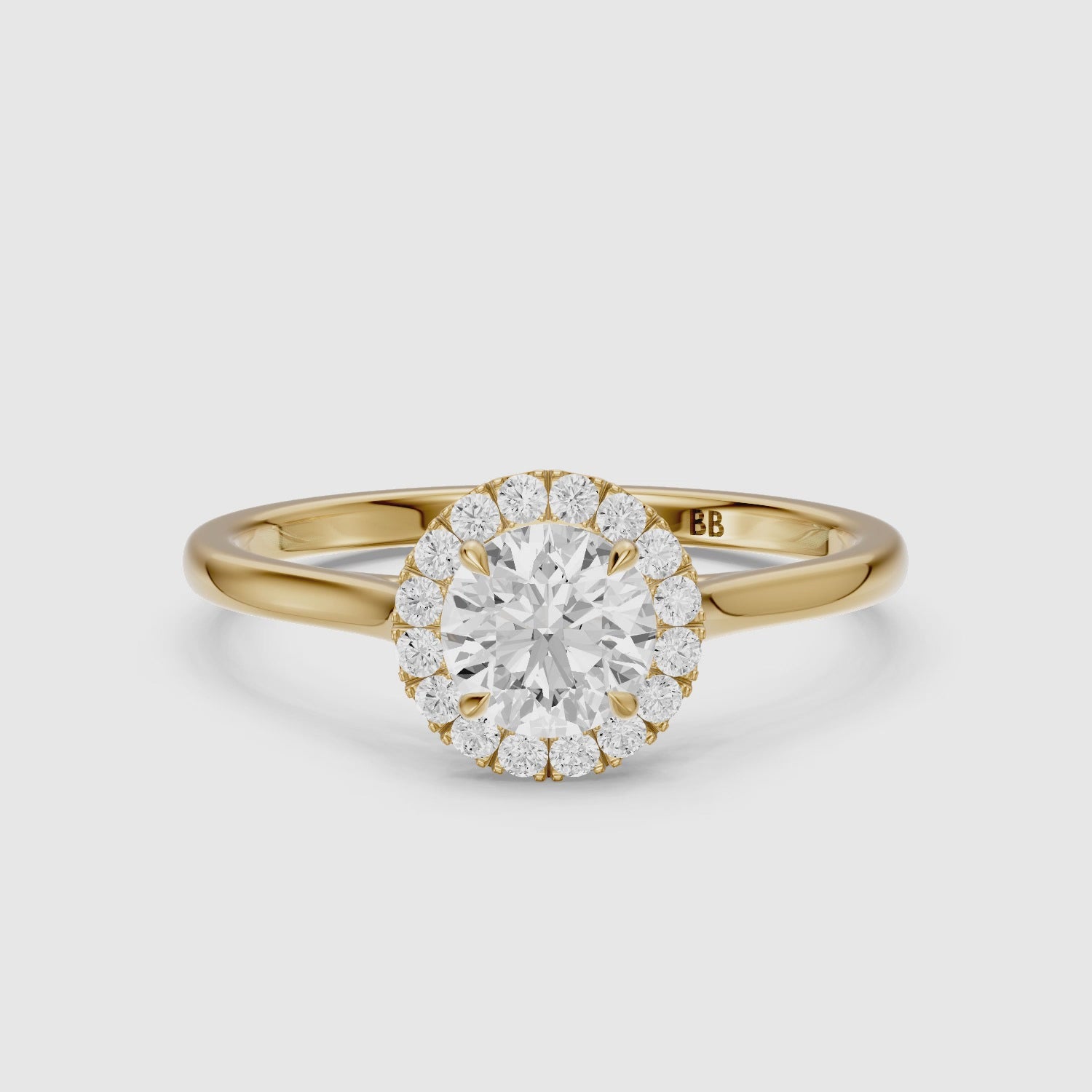 Load video: Karina Round Cut Halo Cathedral Style Moissanite Diamond Ring