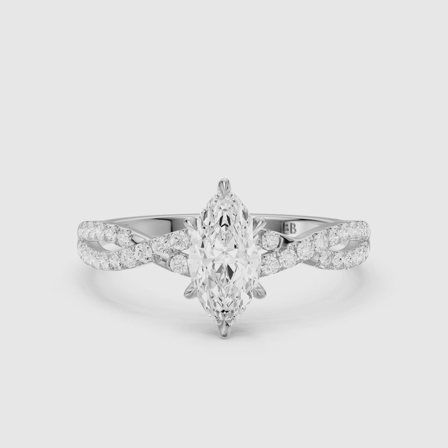 Load video: Freya Marquise Cut Moissanite Diamond Ring with Twisted Pavé Band