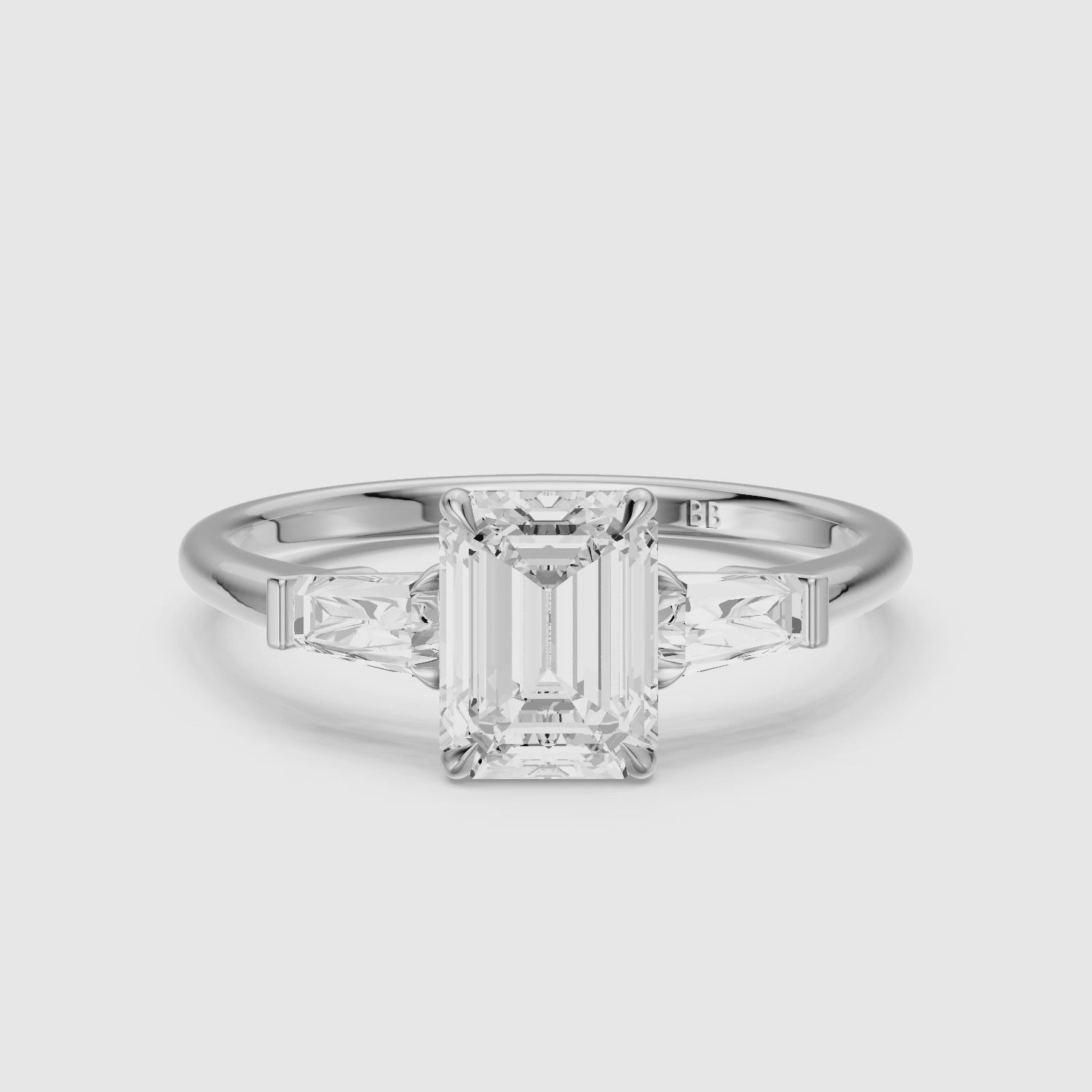 Load video: Melania Emerald With Tapered Baguette Cut Moissanite Engagement Ring
