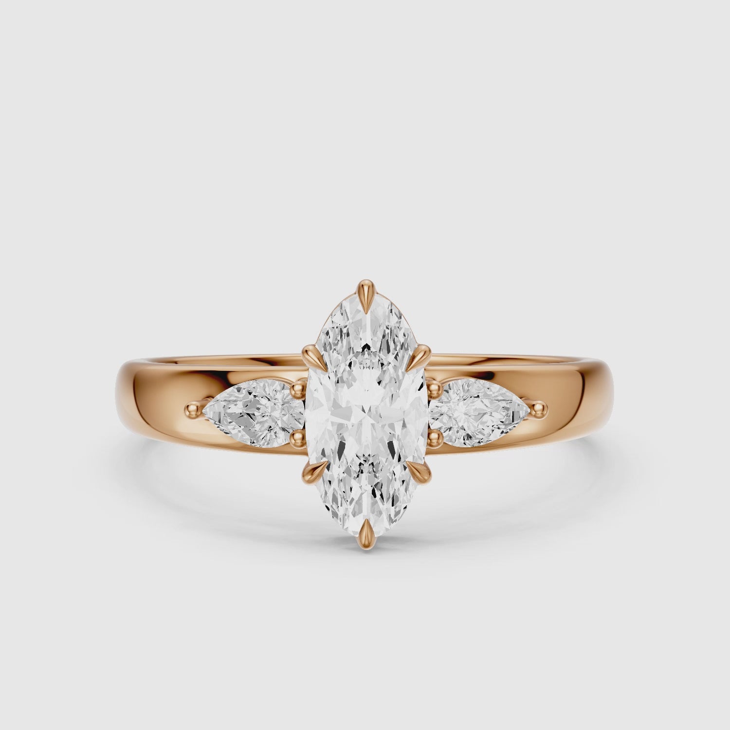 Load video: Celia Moval Moissanite Diamond Three Stone Ring with Pear Stones and Wide Tapered Band