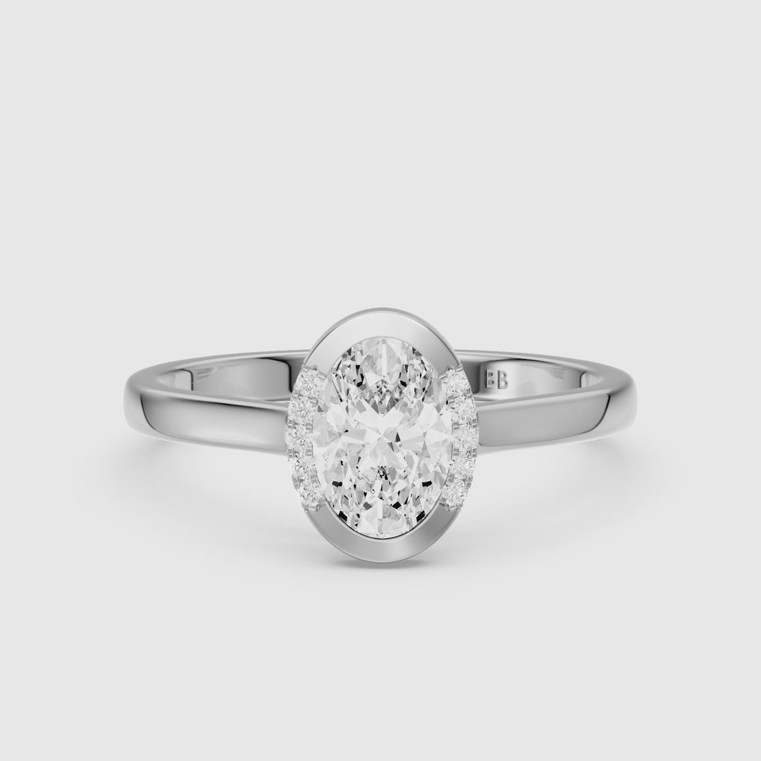 Load video: Lucy Oval Lab Grown Diamond Semi Bezel Hidden Halo Ring