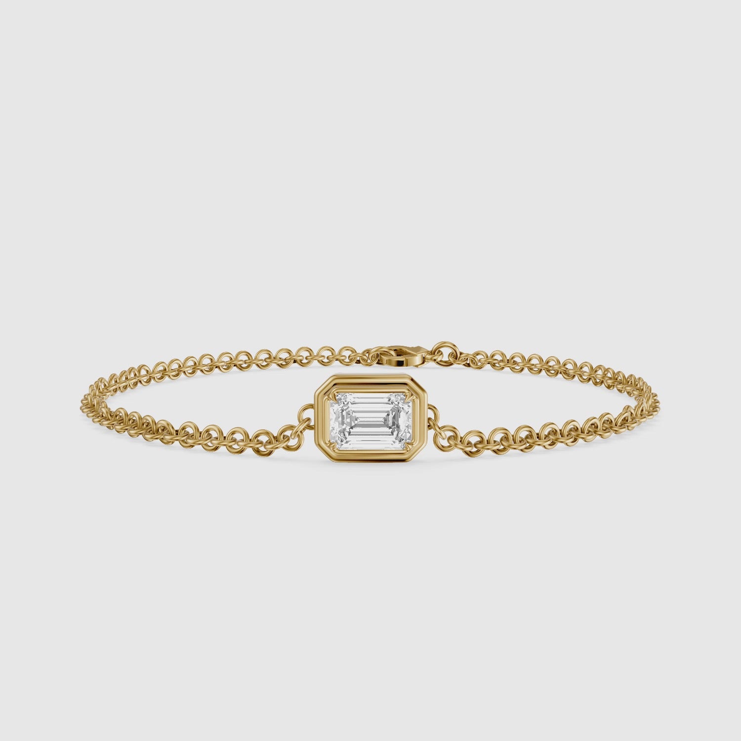 Load video: Keely East West Emerald Cut Lab Grown Diamond Single Stone Bezel Bracelet