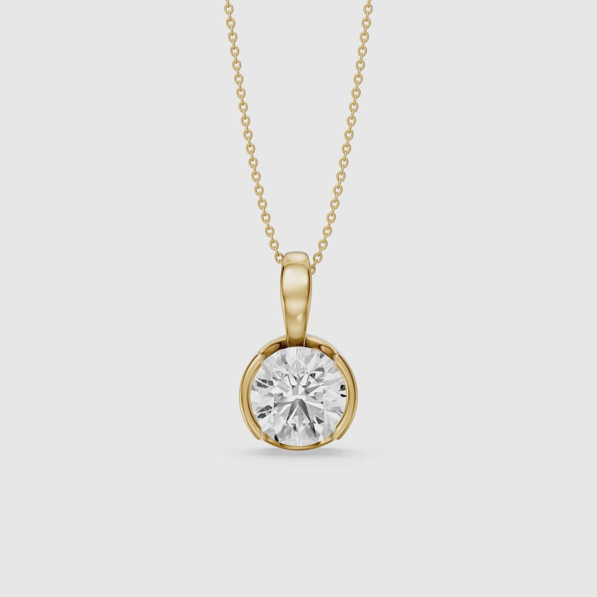 Load video: Morgan Round Lab Grown Diamond Half Bezel Solitaire Pendant