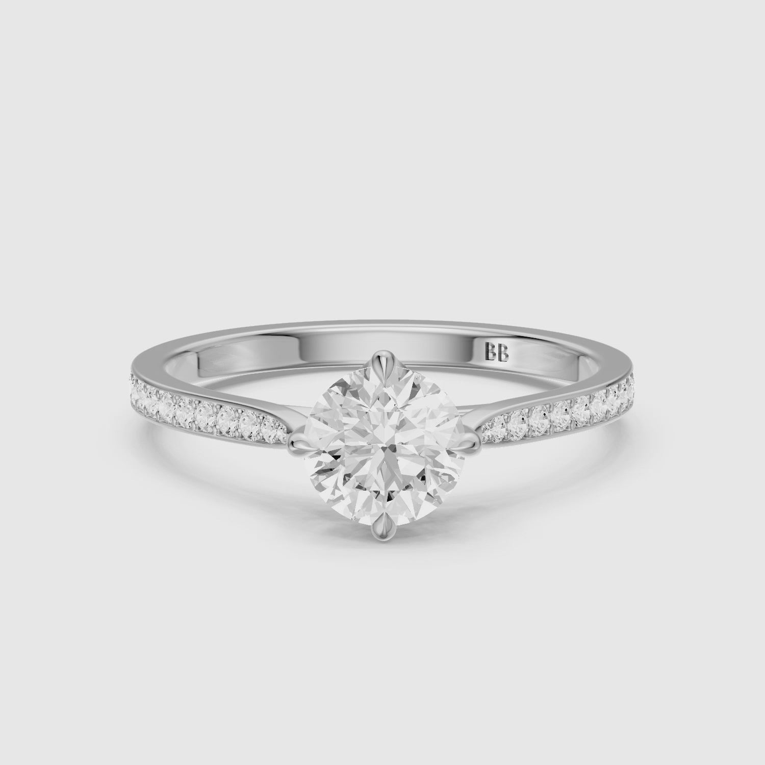 Load video: Callan Round Cut Side Stone Channel Set Lab Grown Diamond Ring