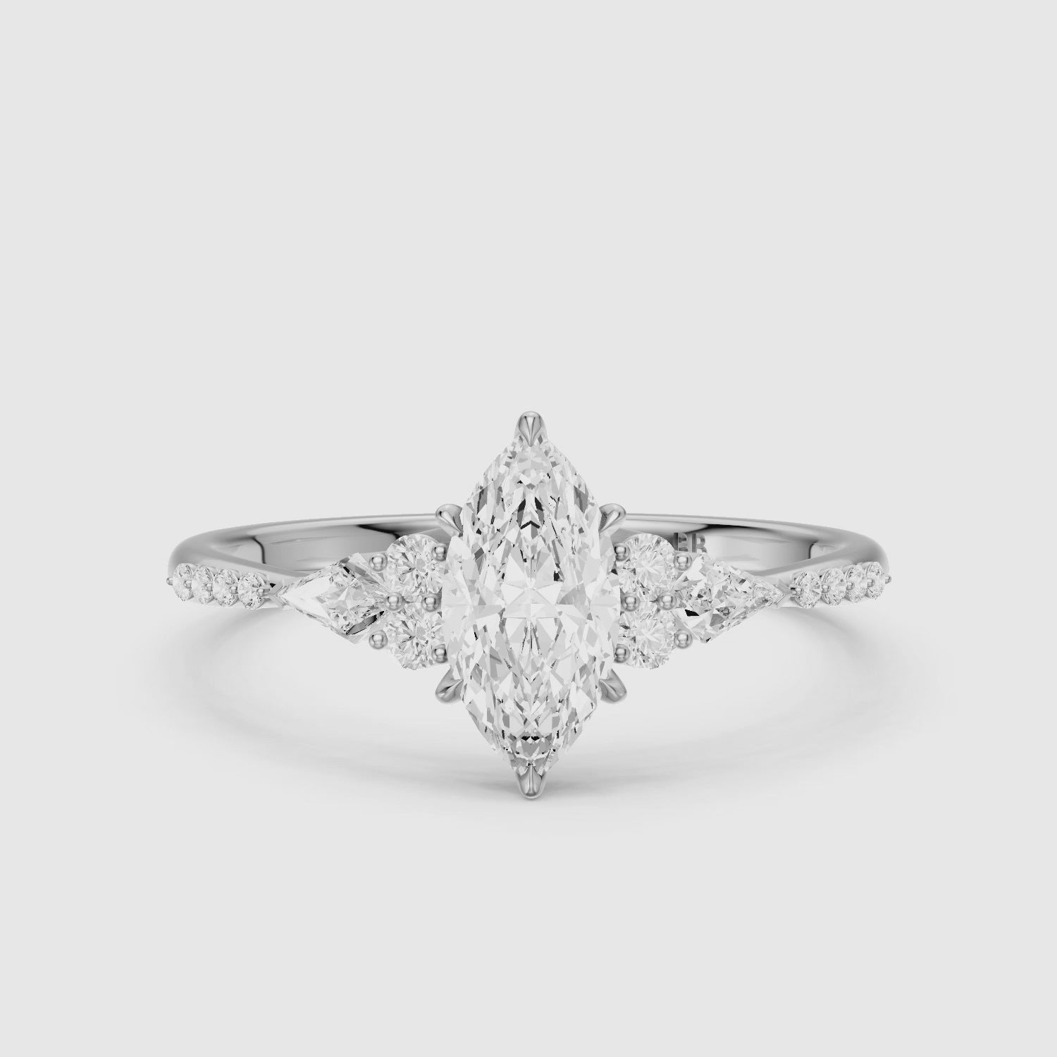 Load video: Charlie Marquise Cut Lab Grown Diamond Ring with Round and Kite Side Stones