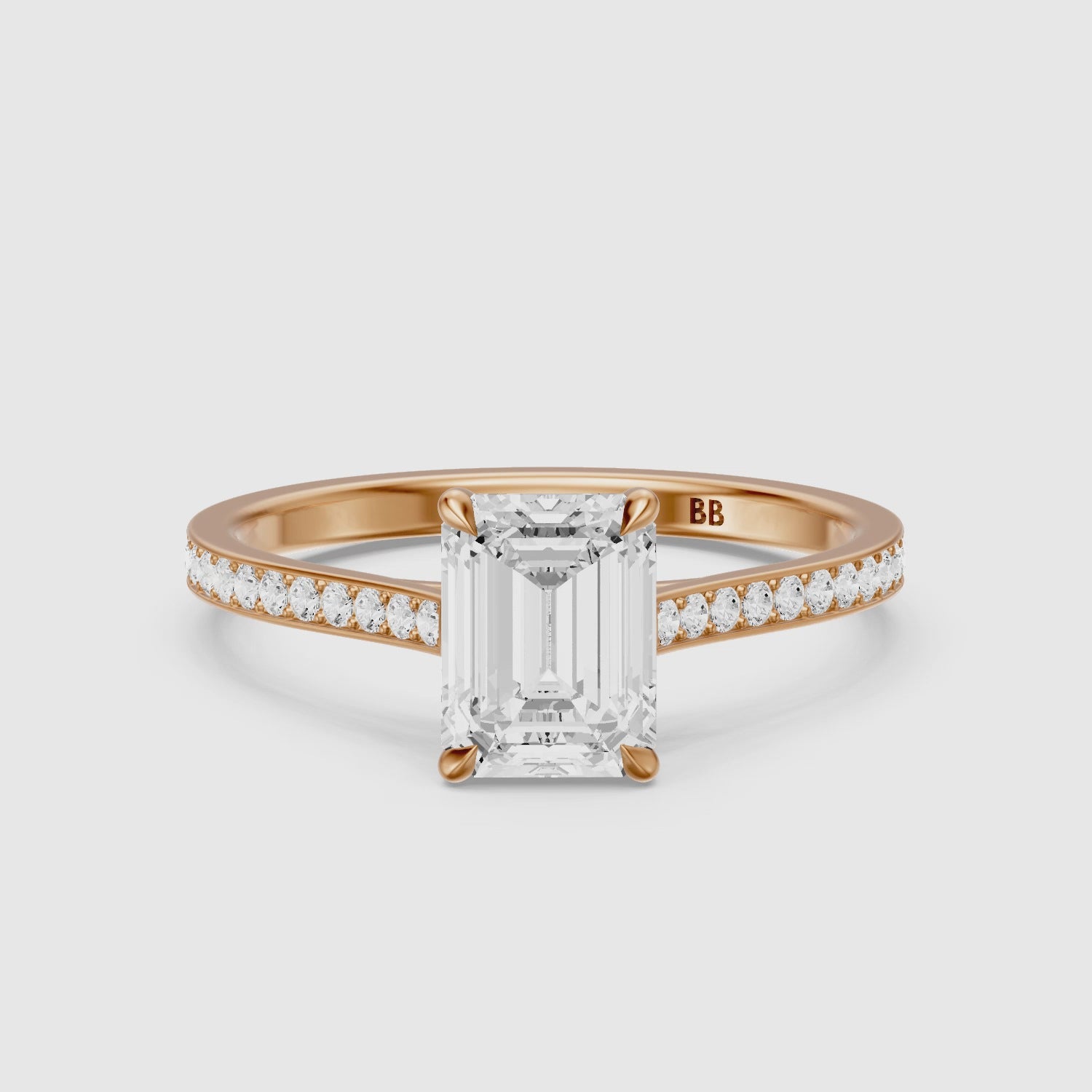 Load video: Raegan Emerald Cut Side Stone Channel Set Moissanite Diamond Ring