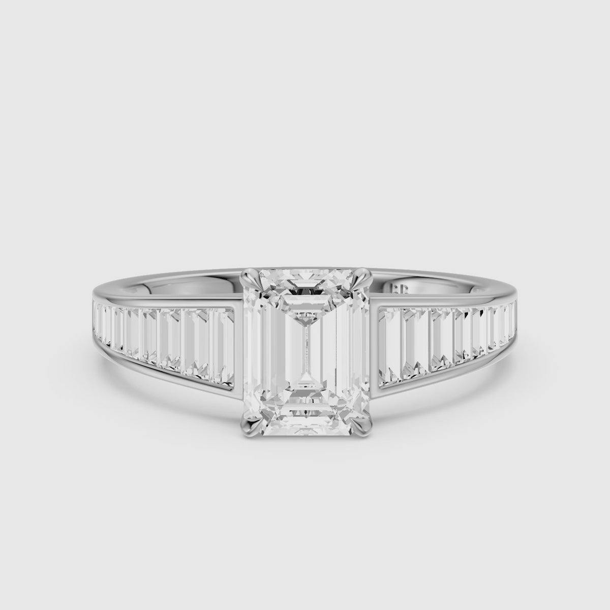 Load video: Angelina Emerald Cut Moissanite Diamond Engagement Ring with Baguette Side Stones