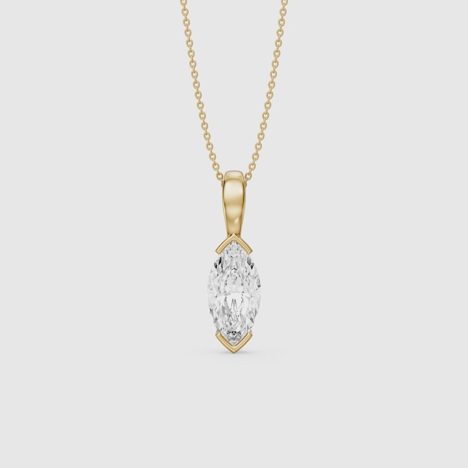 Load video: Ariyah Marquise Half Bezel Lab Grown Diamond Solitaire Pendant