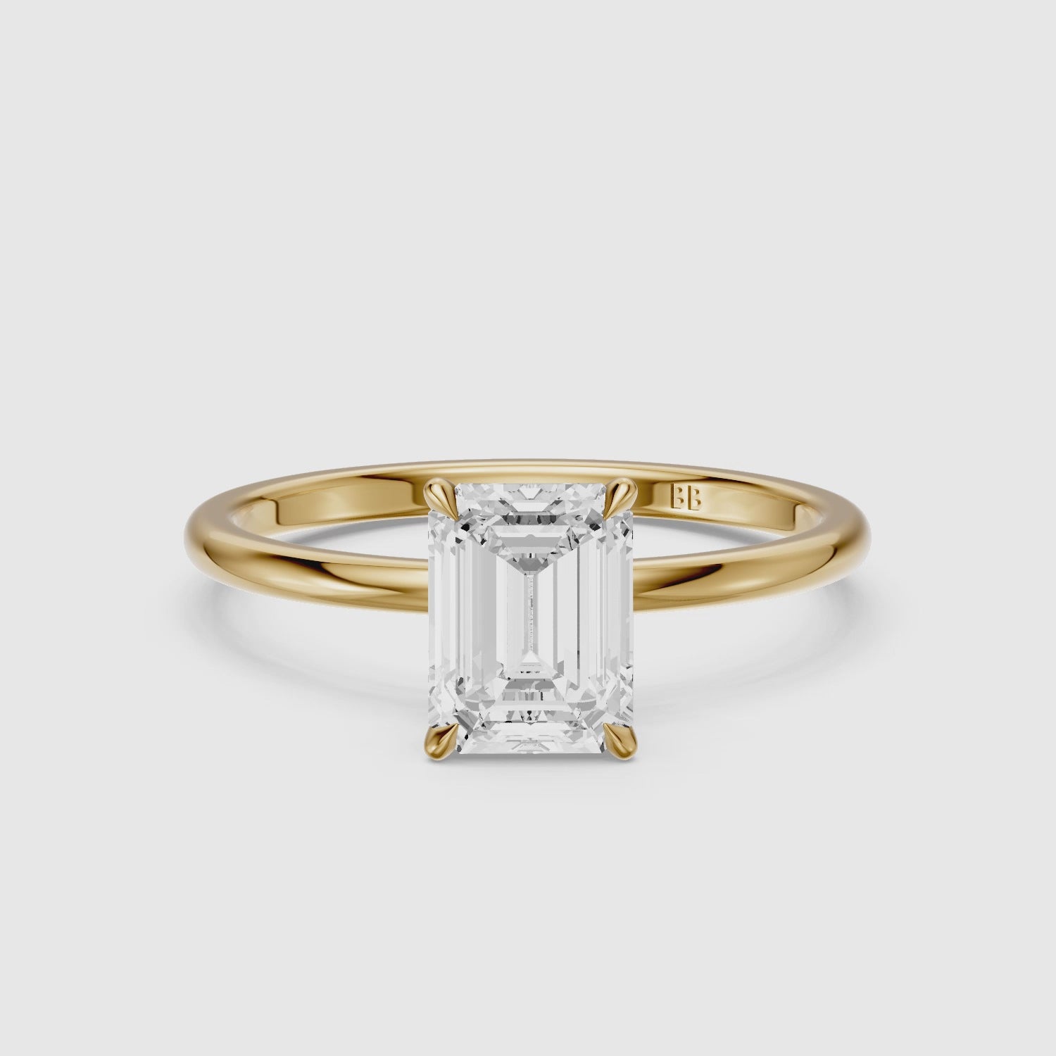 Load video: Edie Hidden Halo Emerald Cut Moissanite Diamond Engagement Ring