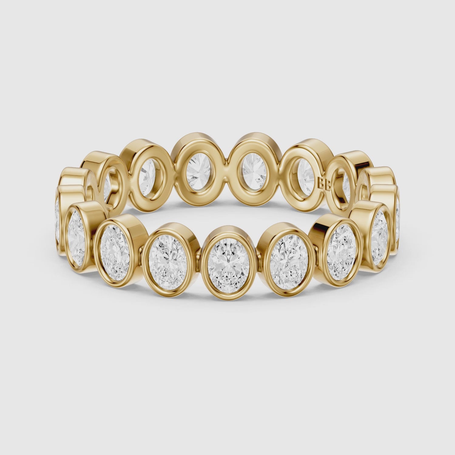 Load video: Rhea Bezel Set Oval Lab Grown Diamond Eternity Band