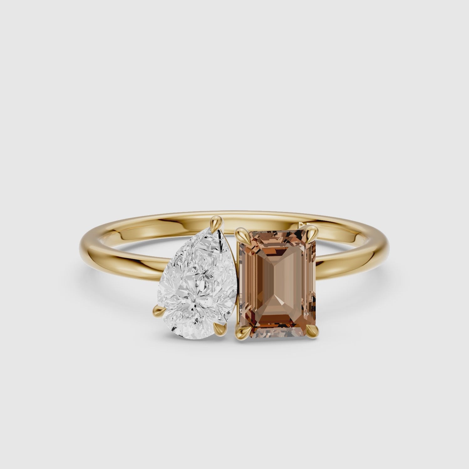 Load video: Bojana Champagne Emerald Cut and Pear Shape Color Lab Grown Diamond Toi et Moi Ring