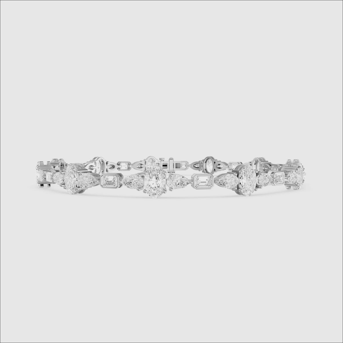 Load video: Remy Pear Oval with Bezeled Emerald Cut Lab Grown Diamond Tennis Bracelet