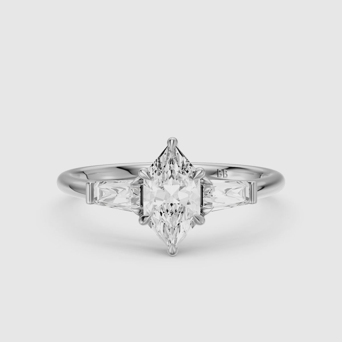 Load video: Dulce Dutch Marquise Lab Grown Diamond Three Stone Ring with Tapered Baguettes