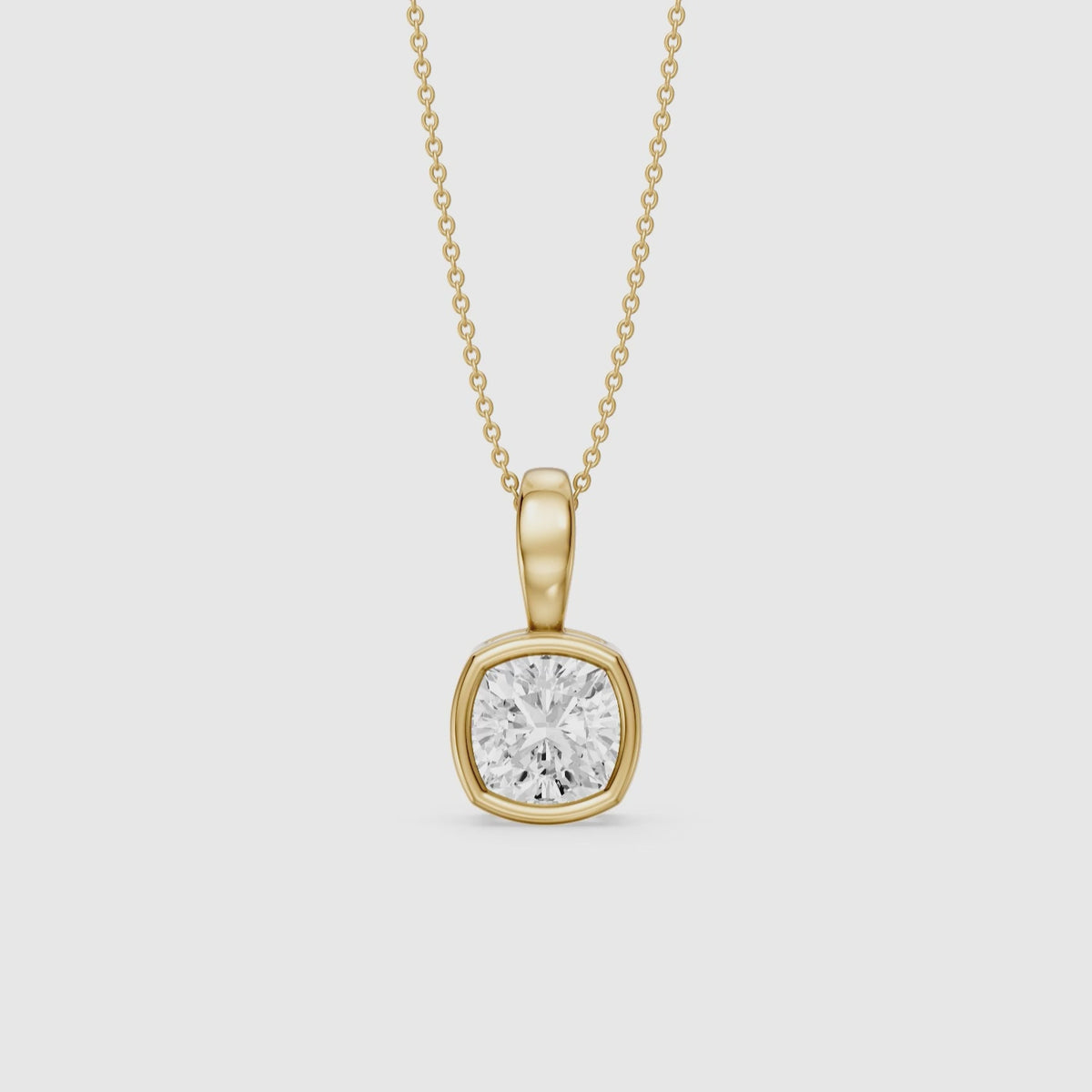 Load video: Gia Cushion Lab Grown Diamond Bezel Solitaire Pendant