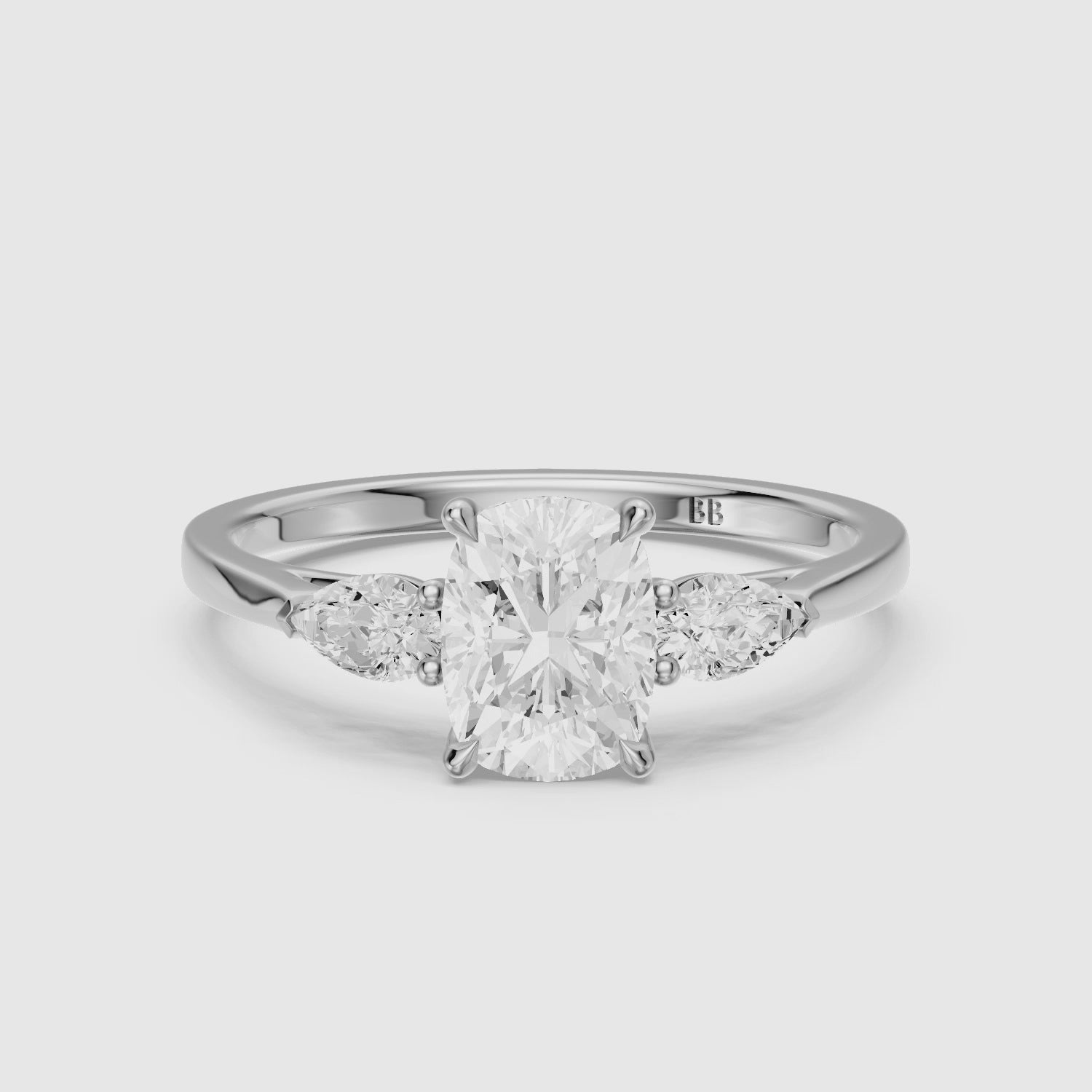 Load video: Nalani Three Stone Elongated Cushion Cut Lab Grown Diamond Ring with Pear Side Stones