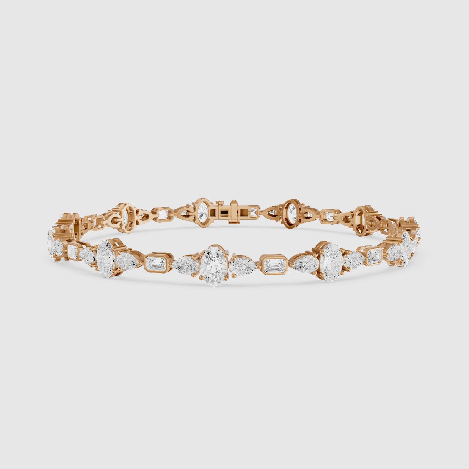 Load video: Remy Pear Oval with Bezeled Emerald Cut Lab Grown Diamond Tennis Bracelet