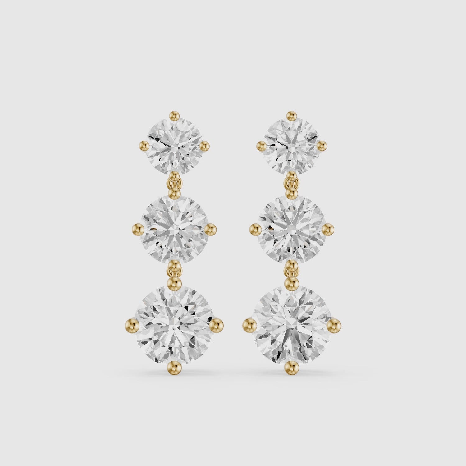 Load video: Danica Round Lab Grown Diamond Three Stone Graduated Drop Earrings
