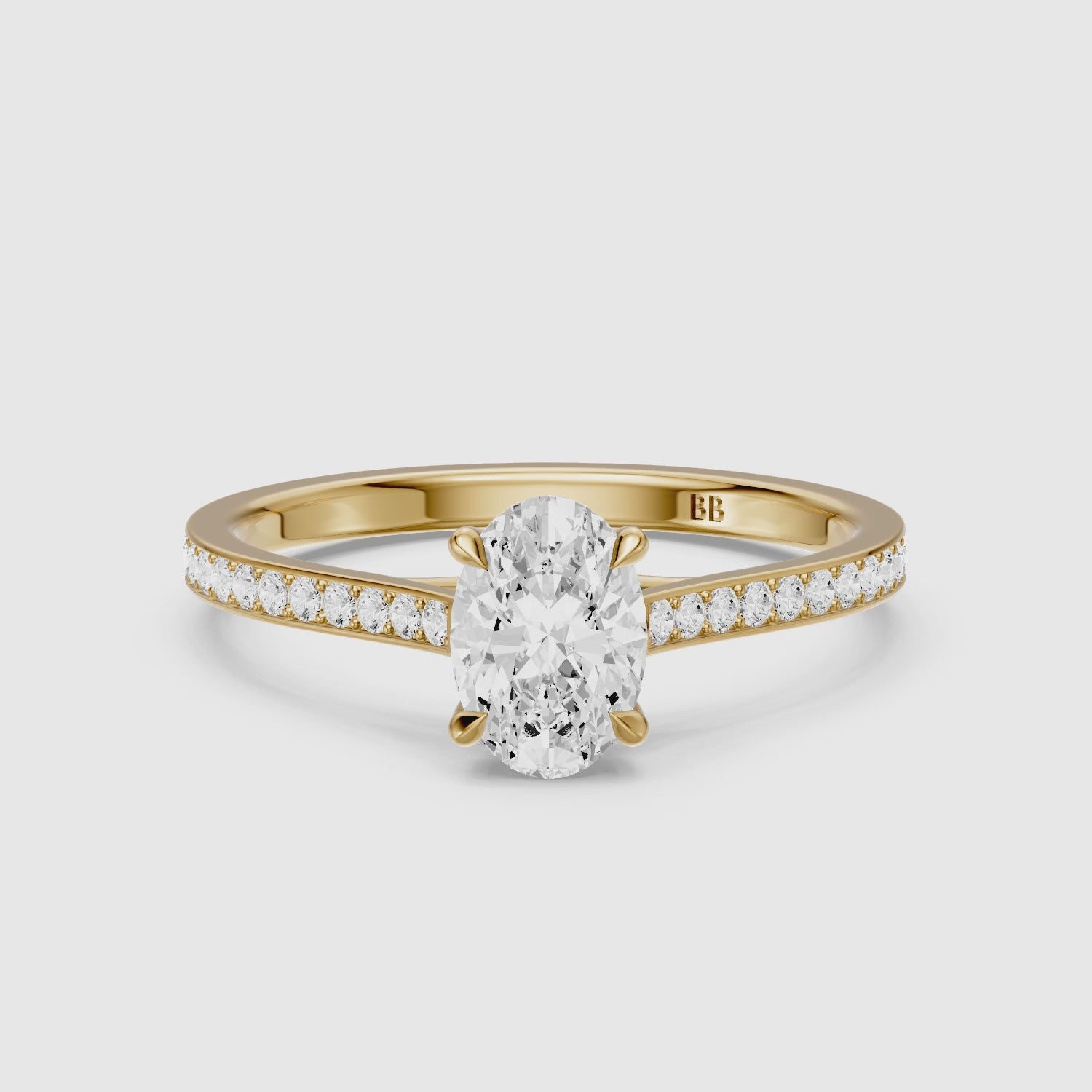 Load video: Kairen 4 Prong Oval Cut Side Stone Channel Set Moissanite Diamond Ring