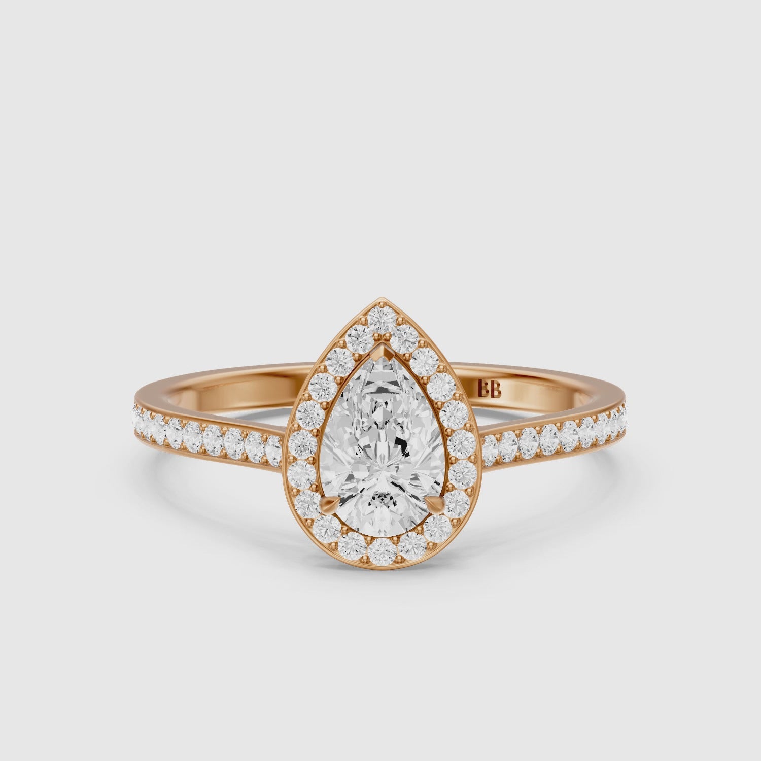 Load video: Darcie Pear Cut Halo Channel Set Lab Grown Diamond Ring