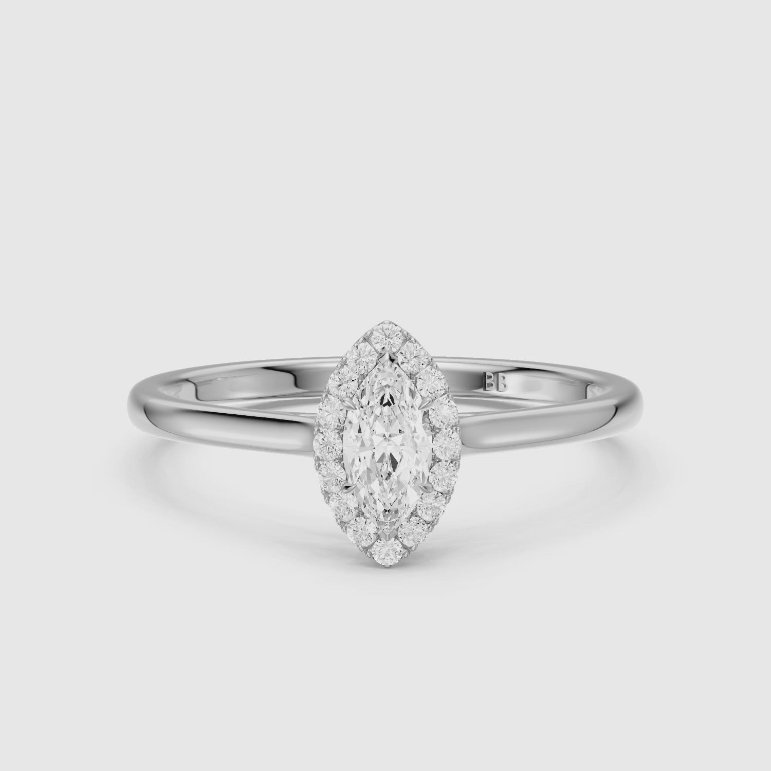 Load video: Trinity Marquise Cut Halo Cathedral Style Lab Grown Diamond Ring