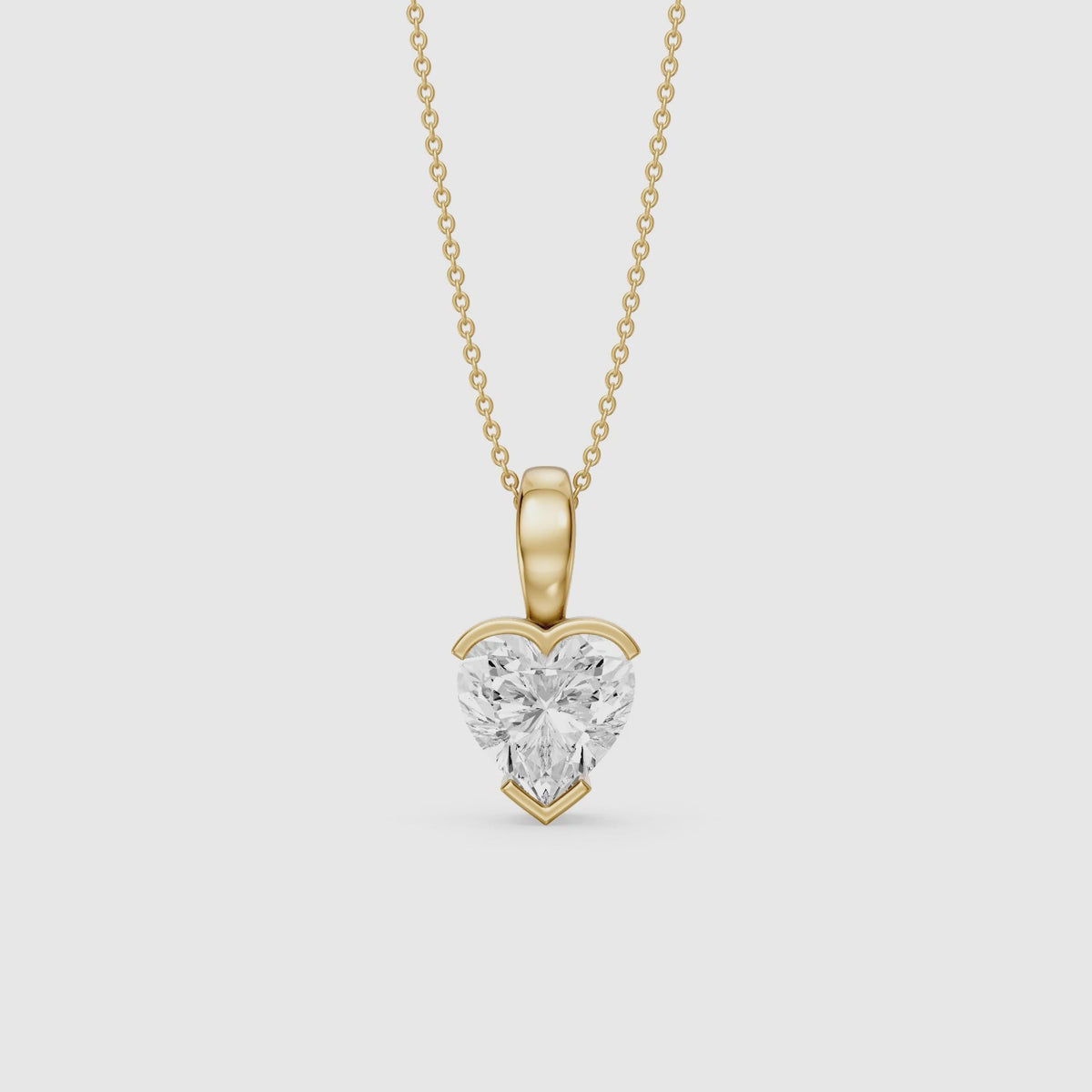 Load video: Jordyn Heart Shape Lab Grown Diamond Half Bezel Pendant