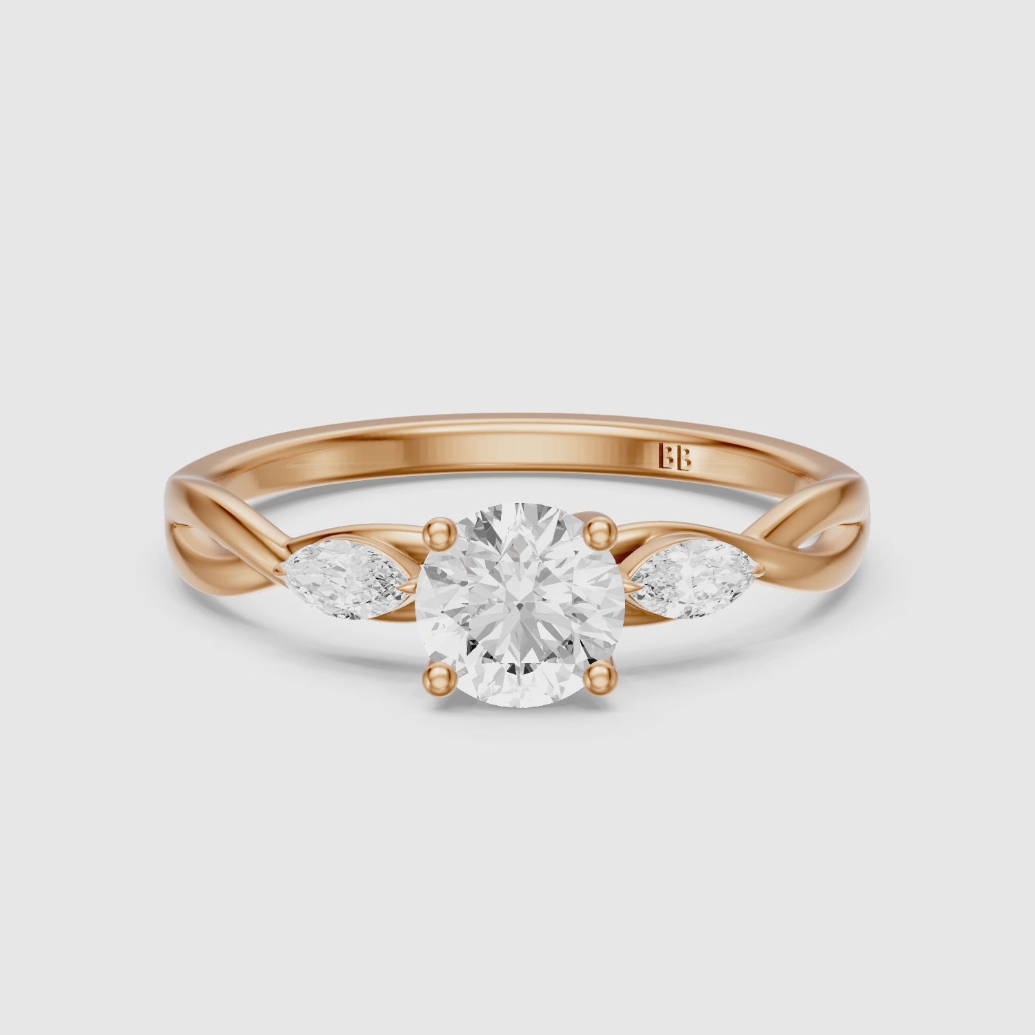 Load video: June Round Cut Side Stone Lab Grown Diamond Ring with Twisted Vine Band