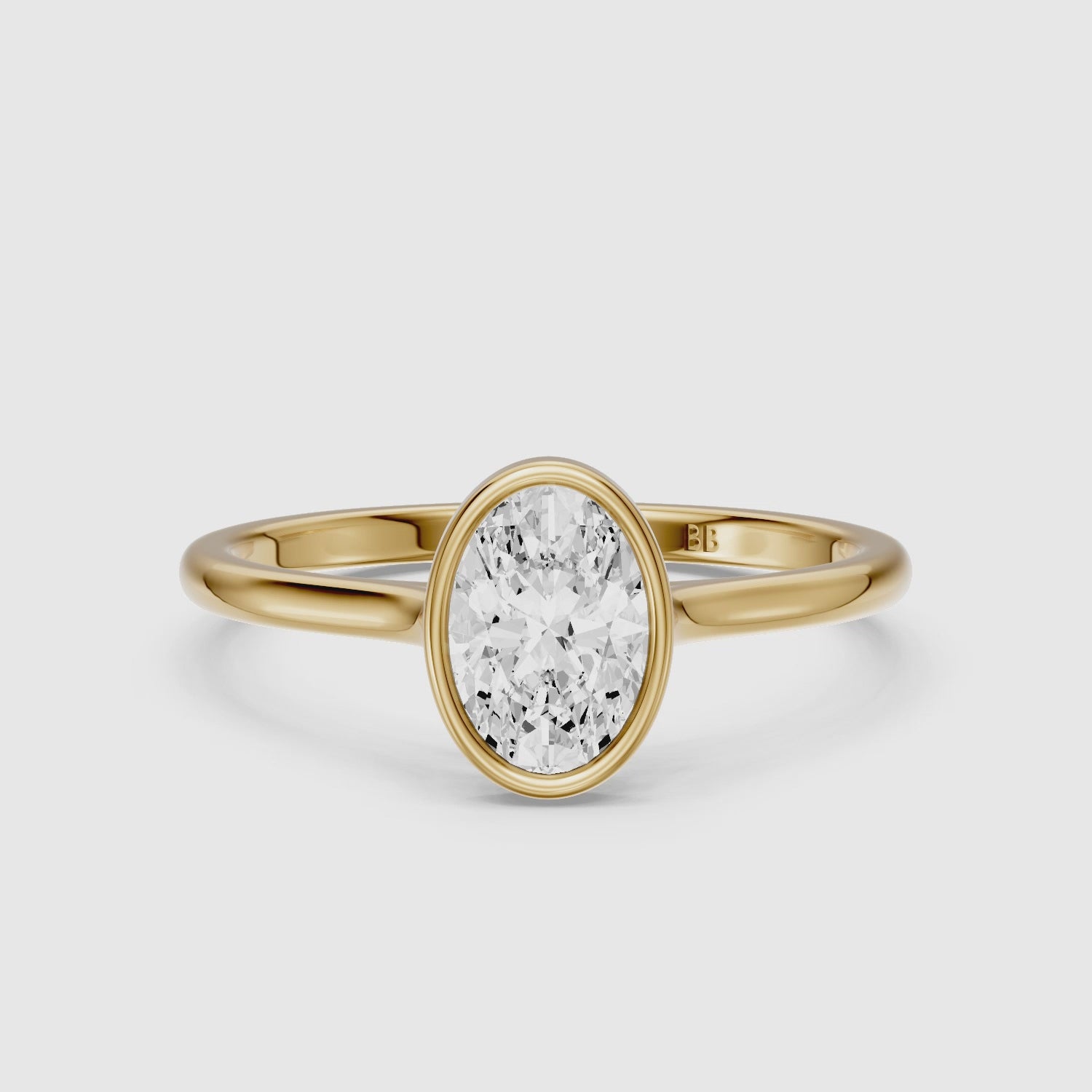 Load video: Nina Oval Cut Bezel Set Solitaire Lab Grown Diamond Ring