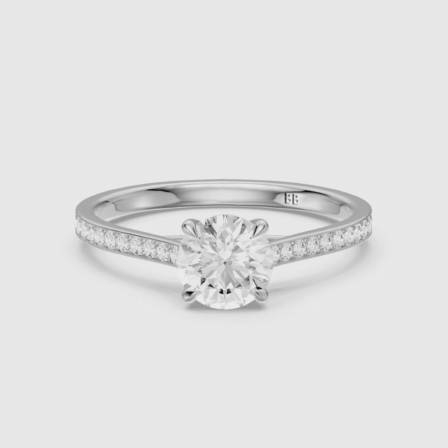 Load video: Jaylene Round Cut Side Stone Channel Set Lab Grown Diamond Ring