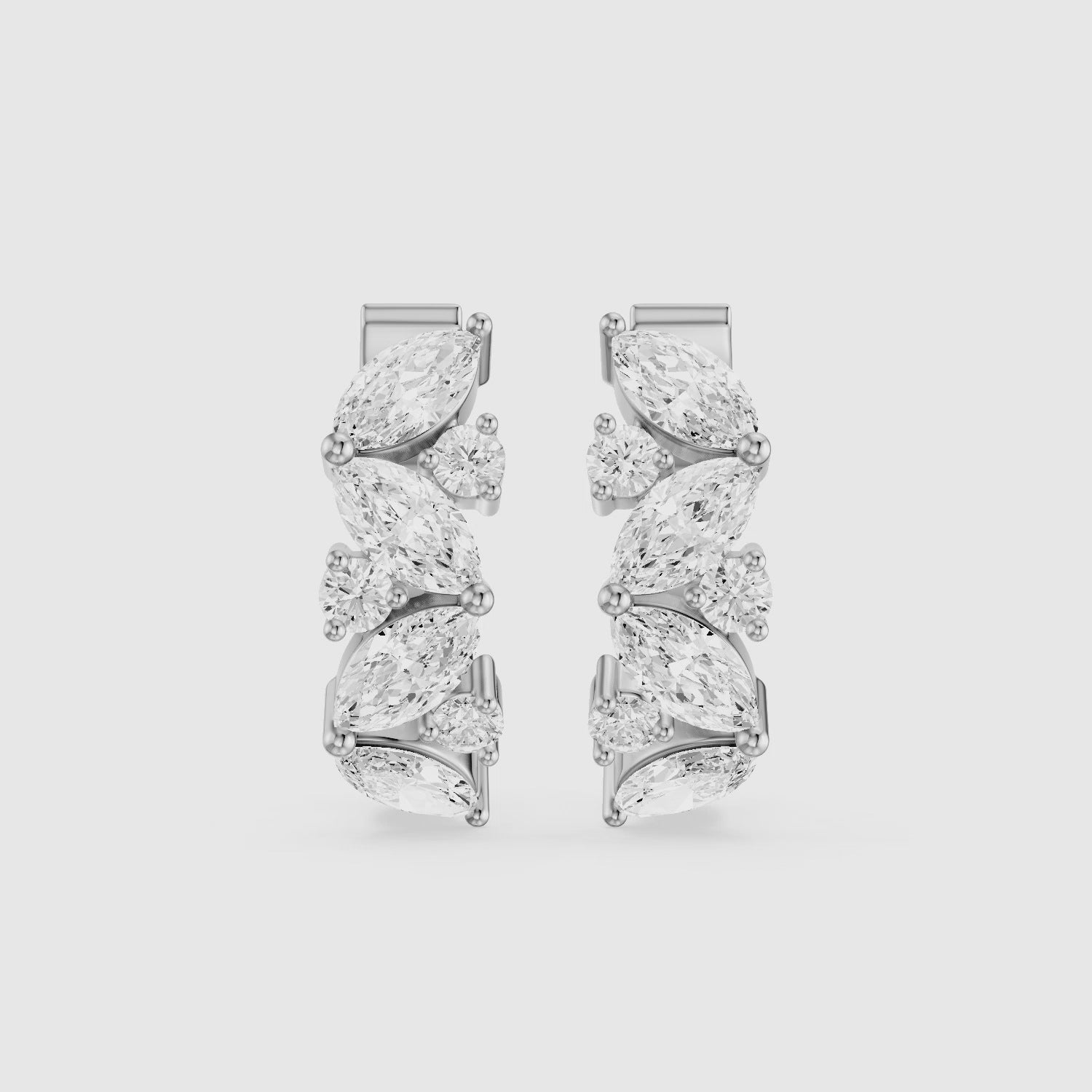 Load video: Tatiana Marquise and Round Cut Lab Grown Diamond Petite Hoop Earrings