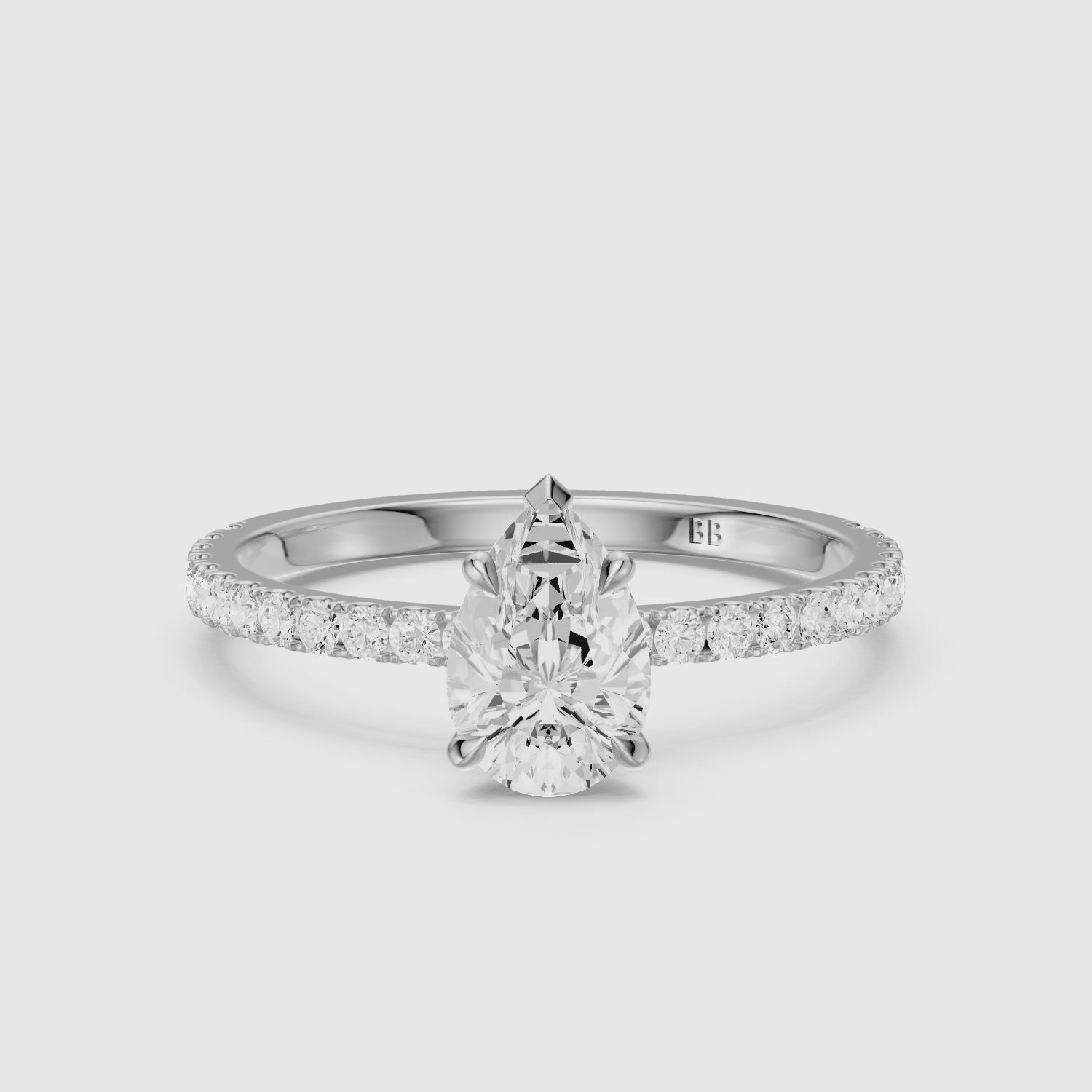 Load video: Kailey 5 Prong Pear Cut Pave Side Stone Moissanite Diamond Ring