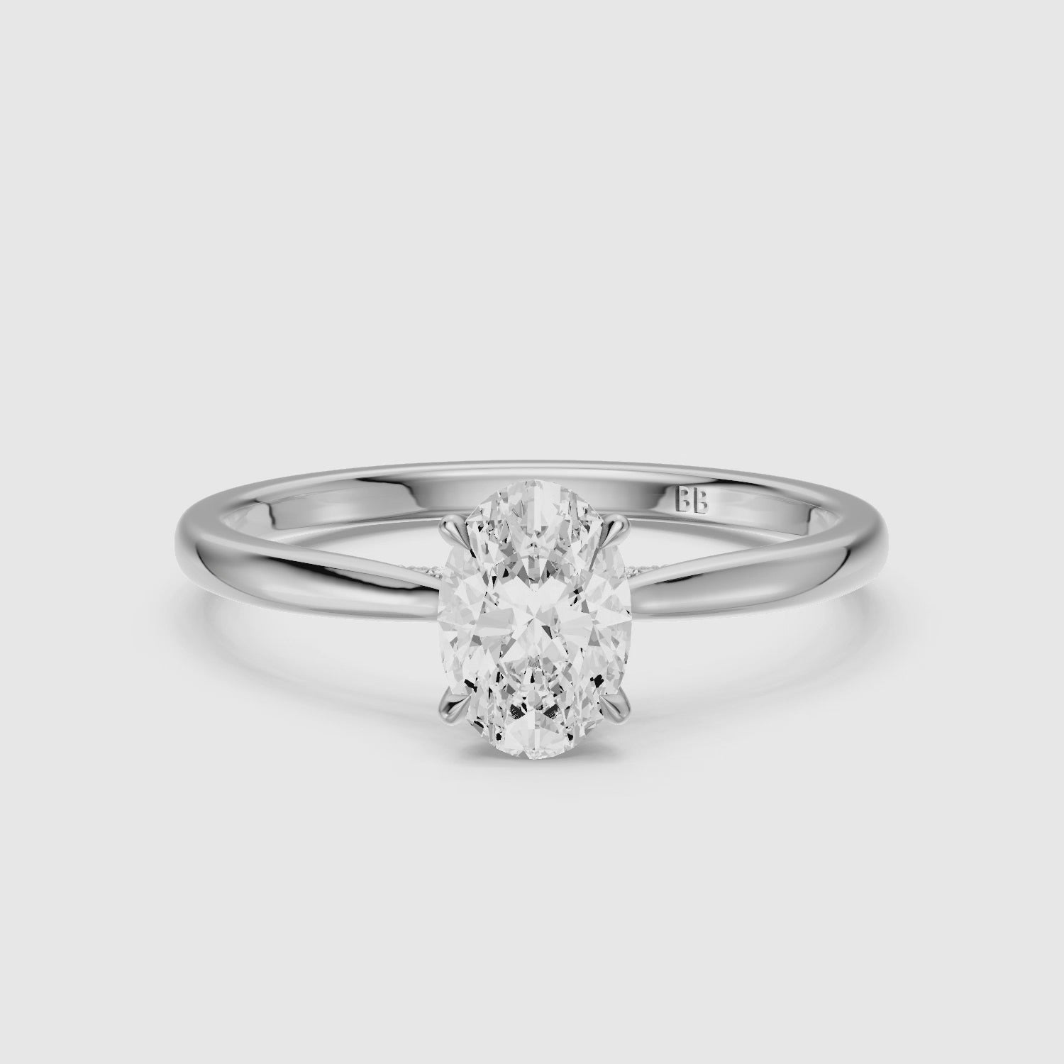 Load video: Lila Oval Lab Grown Diamond Cathedral Ring with Hidden Halo