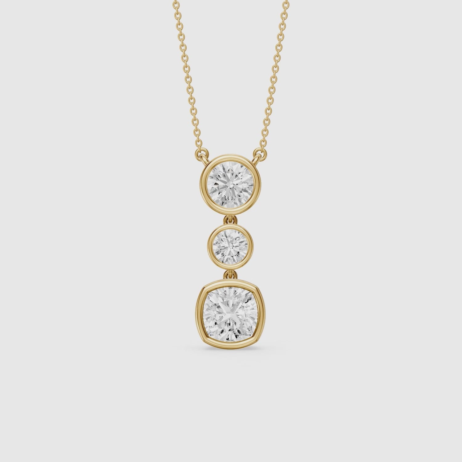 Load video: Amari Three Stone Cushion Cut and Round Cut Lab Grown Diamond Pendant