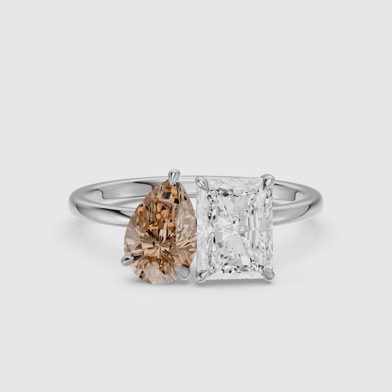 Load video: Saskia Champagne Pear and Radiant Cut Colored Lab Grown Diamond Toi et Moi Ring
