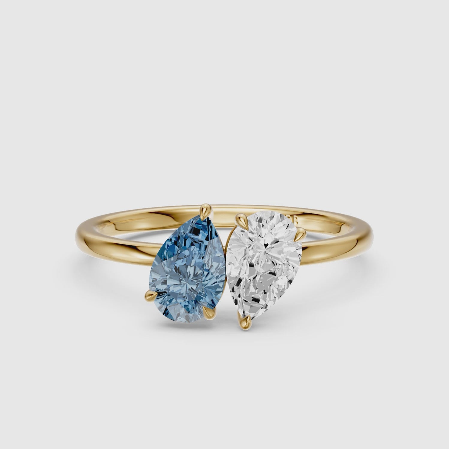 Load video: Axelle Blue and White Both Pear Cut Color Lab Grown Diamond Toi et Moi Ring