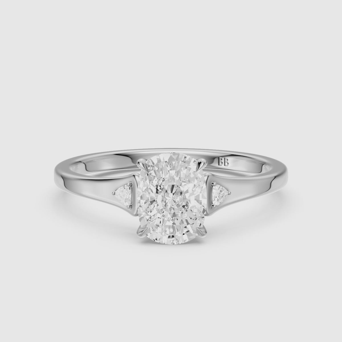 Load video: Kori Elongated Cushion Moissanite Diamond Ring with Trillion Side Stones