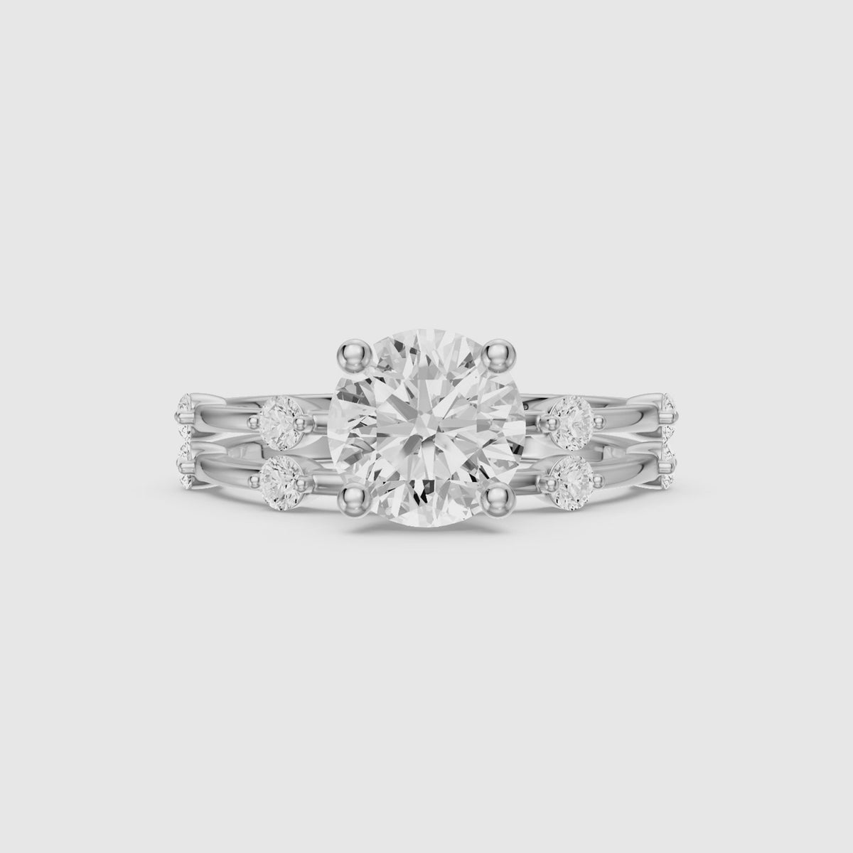 Load video: Ivone Round Lab Grown Diamond Station Accent Bridal Set