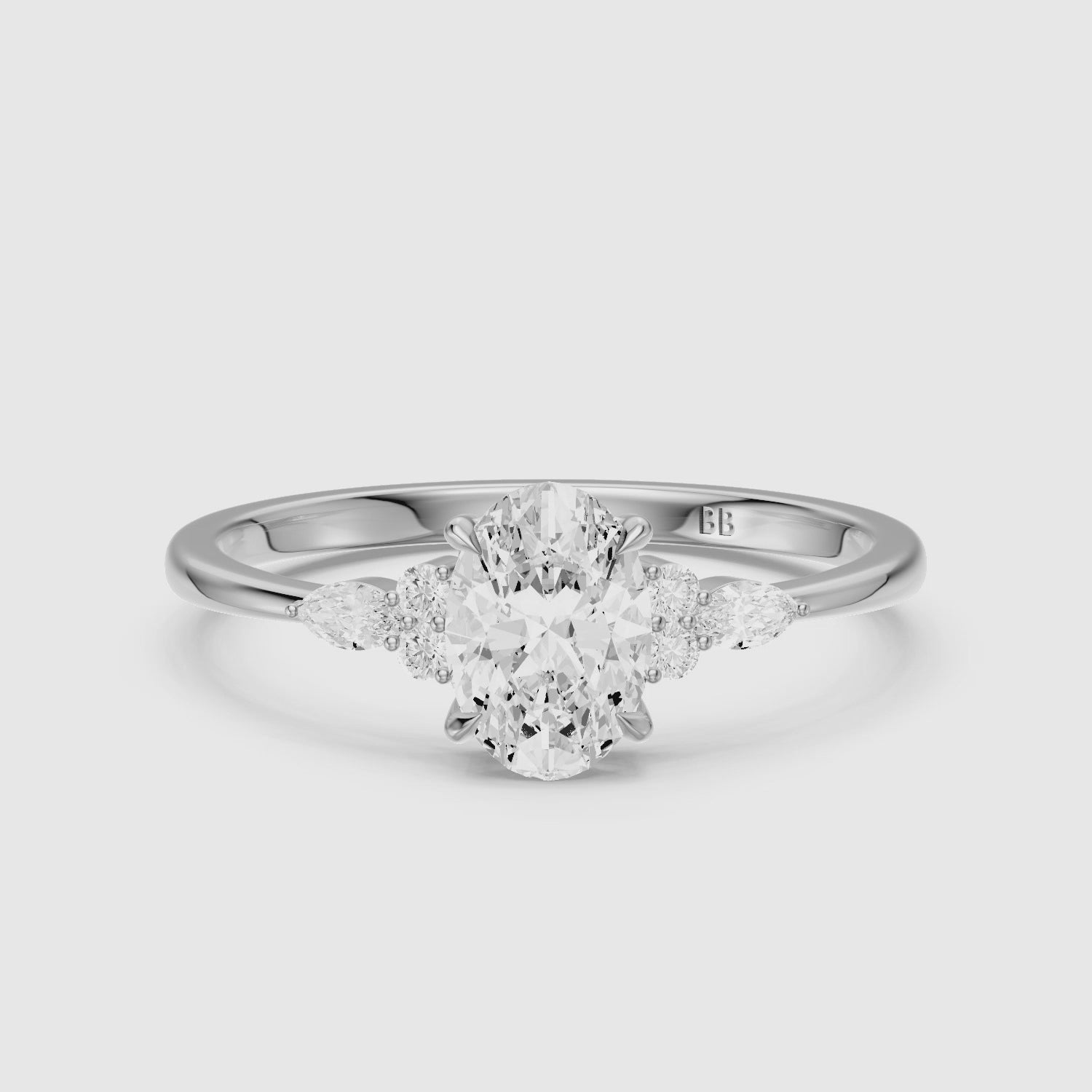 Load video: Melanie Oval Cut Lab Grown Diamond Ring with Marquise and Round Side Stones