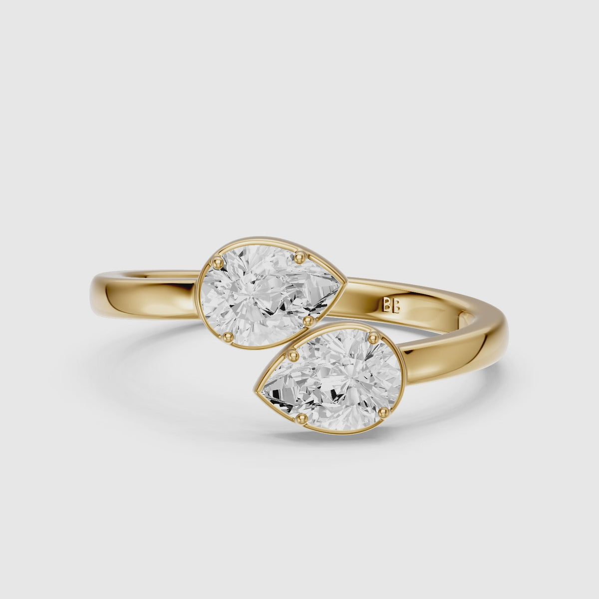 Load video: Vyla Pear Lab Grown Diamond Toi et Moi Solitaire Engagement Ring