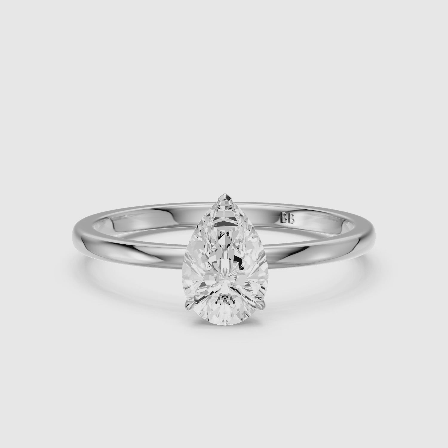 Load video: Demi Pear Cut Low Profile Solitaire Lab Grown Diamond Ring